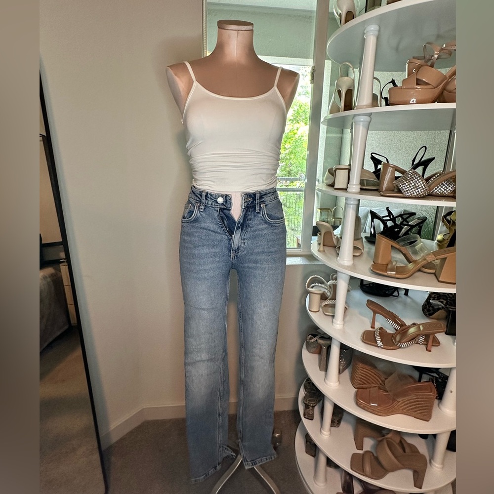 Zara Slim flare jeans, slit at ankle.